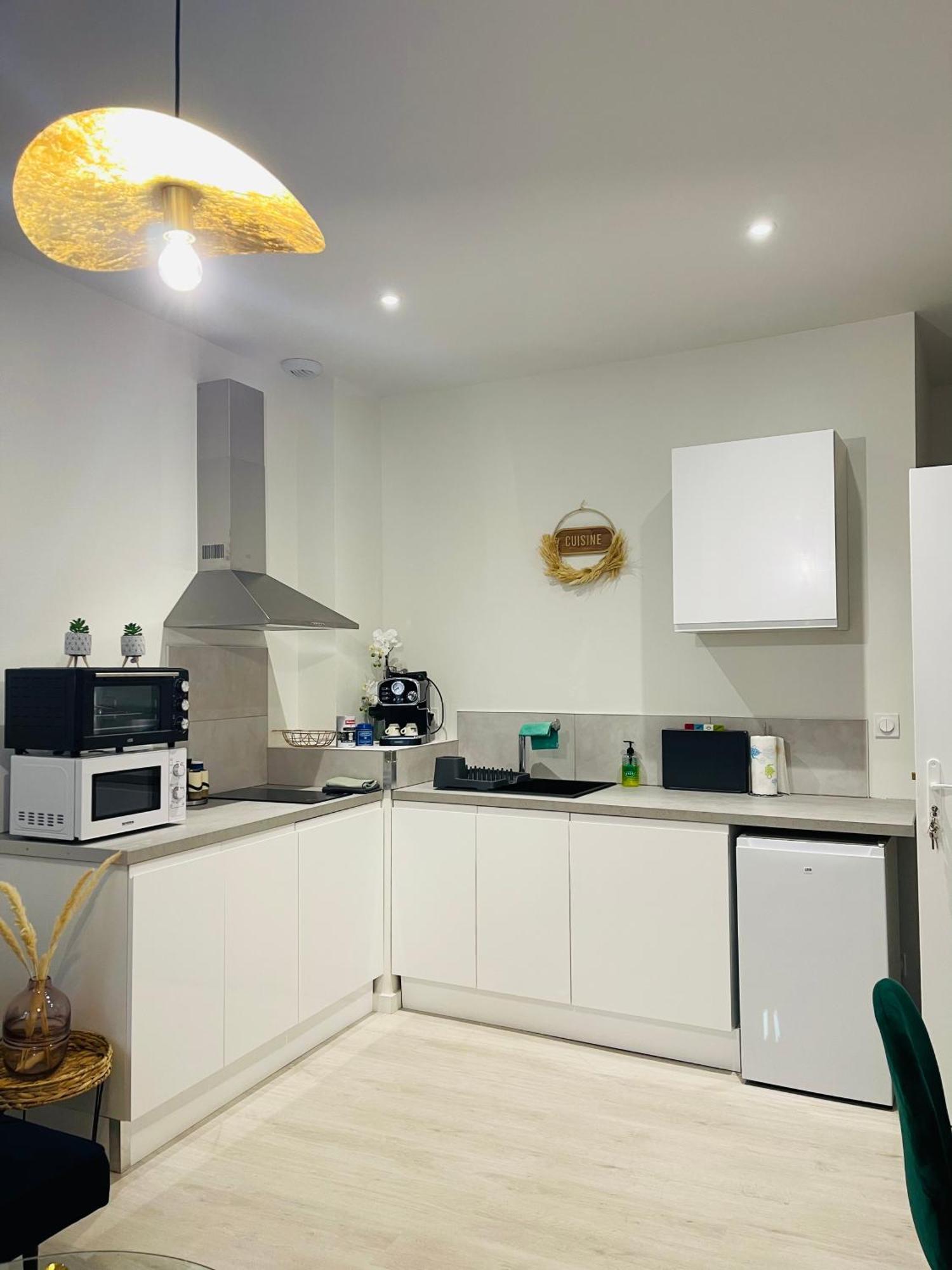 Apartment Le Caubous Plein Centre Appartement Calme Avec Chambre Et Cuisine Equipee